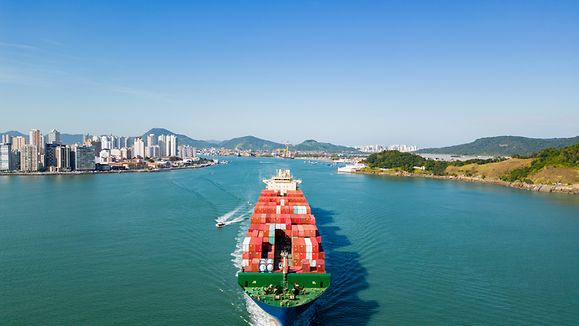 Ship with containers leaving port